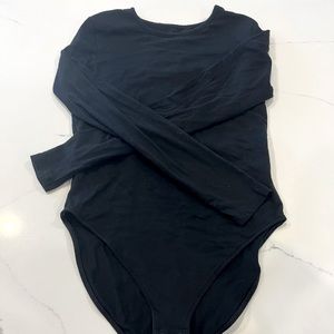 Black long sleeve bodysuit.